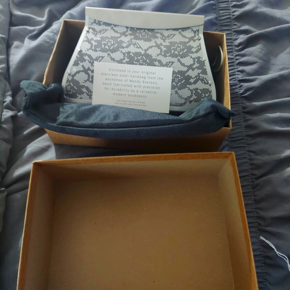 Wendy Stevens stainless steel Lace clutch
